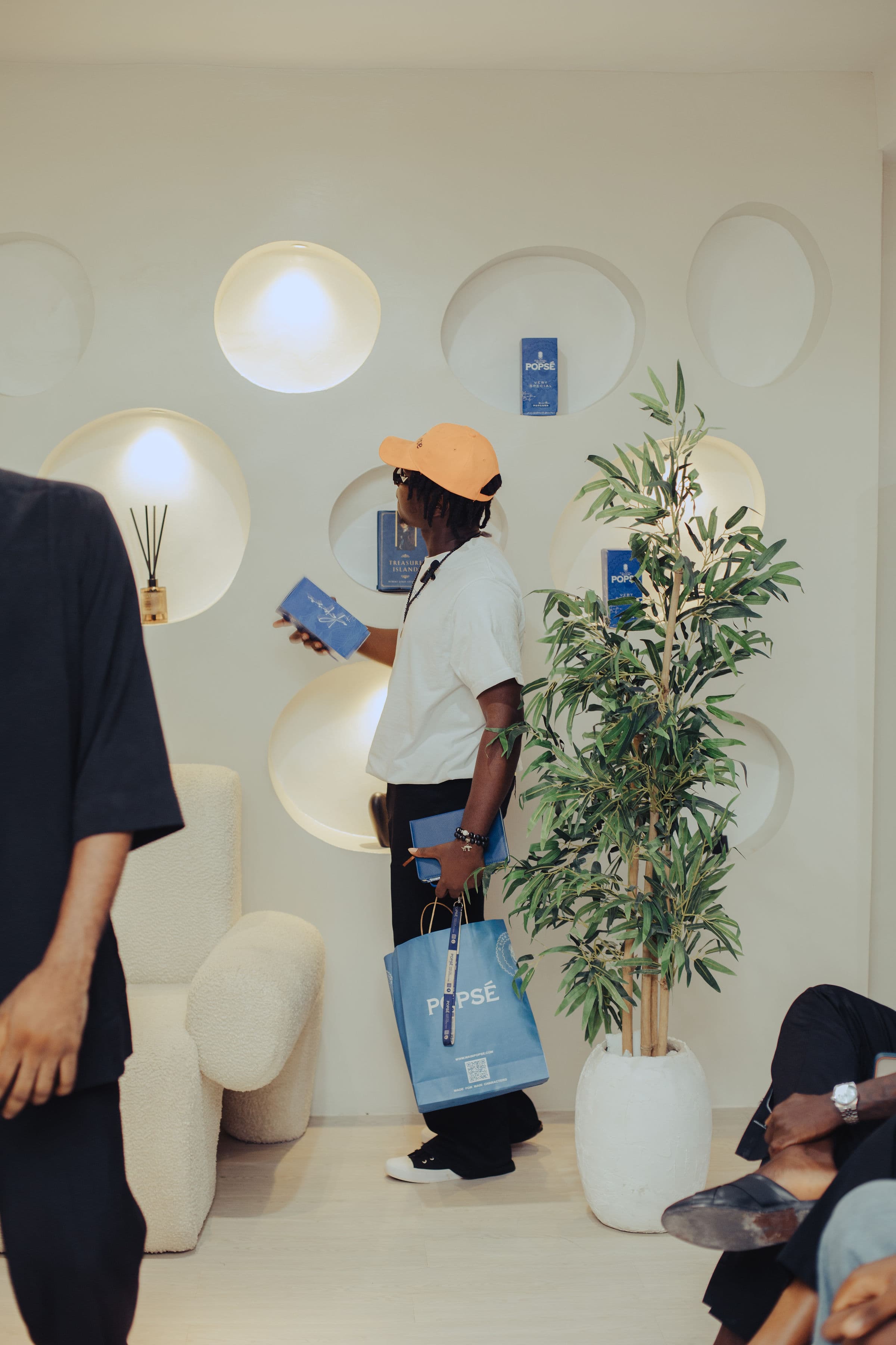 Content creator filming with professional video lighting at Open Shore Studios, Benin City